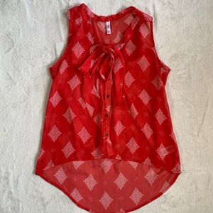 Xhilaration red sheer hi-low woman’s tank. Size M